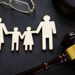 Family law concept. Figures and gavel. Divorce.
